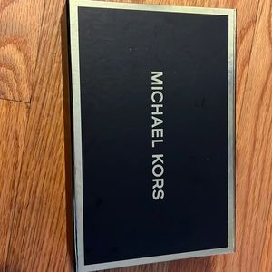 Pink Michael Kors jet travel wallet